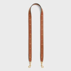 New LONG STRAP in smooth CALFSKIN WITH TRIOMPHE STUDS with Gold Finishing Women Categories·Straps And Accessories