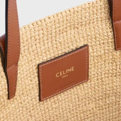Fashion MEDIUM SUPPLE CLASSIC PANIER in Raffia and calfskin Women More Lines·Classic Panier | Categories·Hobo And Tote Bags