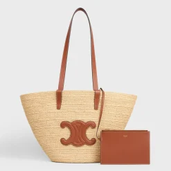 Fashion MEDIUM SUPPLE CLASSIC PANIER in Raffia and calfskin Women More Lines·Classic Panier | Categories·Hobo And Tote Bags