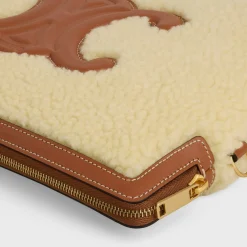 Online SMALL POUCH WITH STRAP in SHEARLING AND CALFSKIN Women More Lines·Cuir Triomphe | Categories·Pouches And Tech Accessories