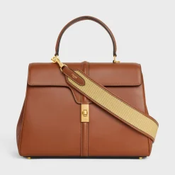 Hot STRAP in raffia effect textile and calfskin with GOLD FINISHING Women Categories·Straps And Accessories